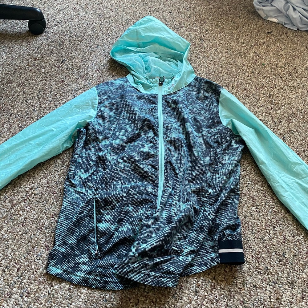 Blue athletic wind breaker